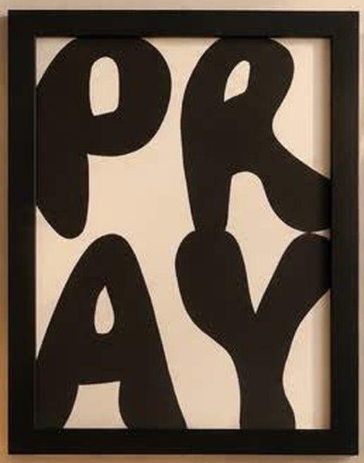 Framed print reading PR AY
